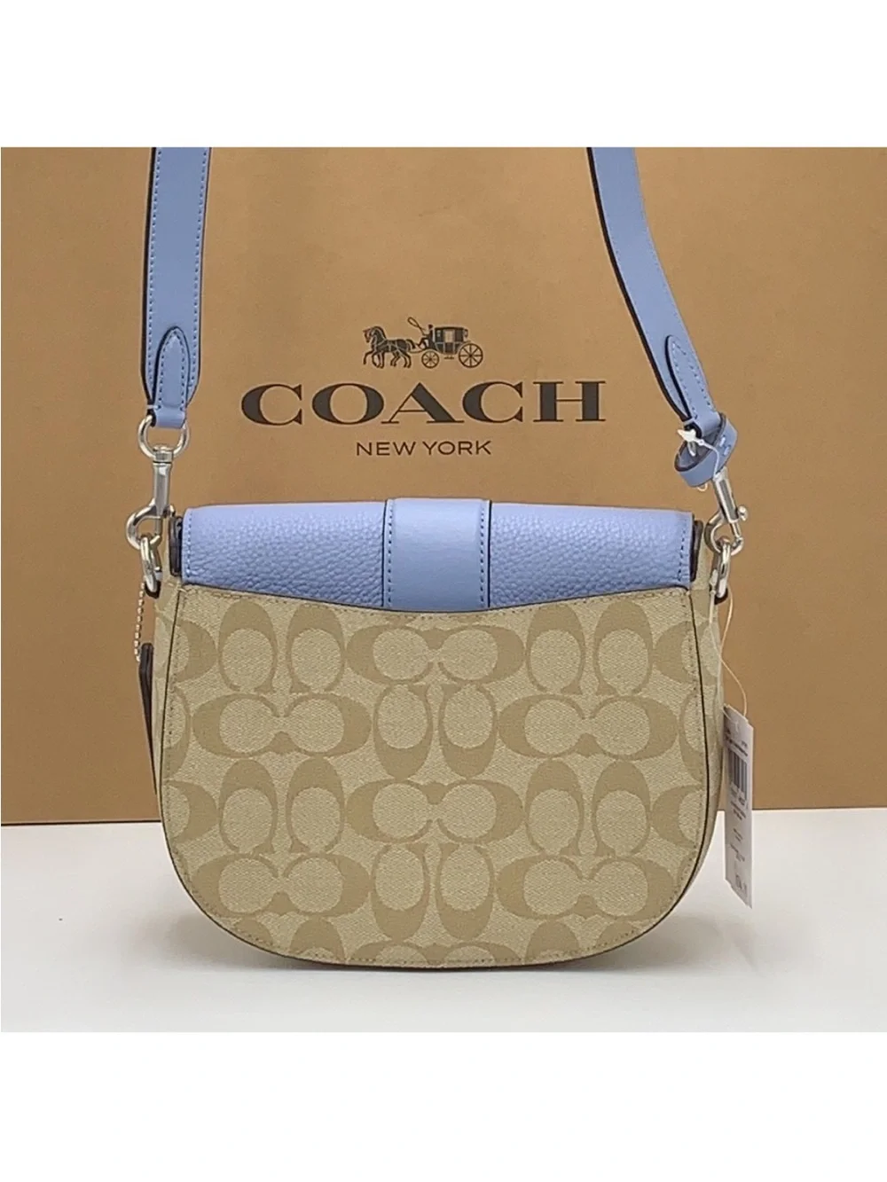 COACH Georgie Saddle Bag In Signat Canvas COLOR:
Silver/Light Khaki/Marble
Blue - Picture 4 of 16